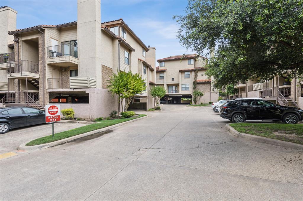 4777 Cedar Springs Road, Unit 6N Dallas, TX 75219 - Photo 6 of 24 a view of a street with cars