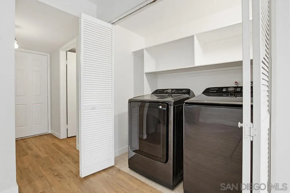 5130 North River Road, Unit B Oceanside, CA 92057 - Photo 21 of 51 a utility room with dryer and washer