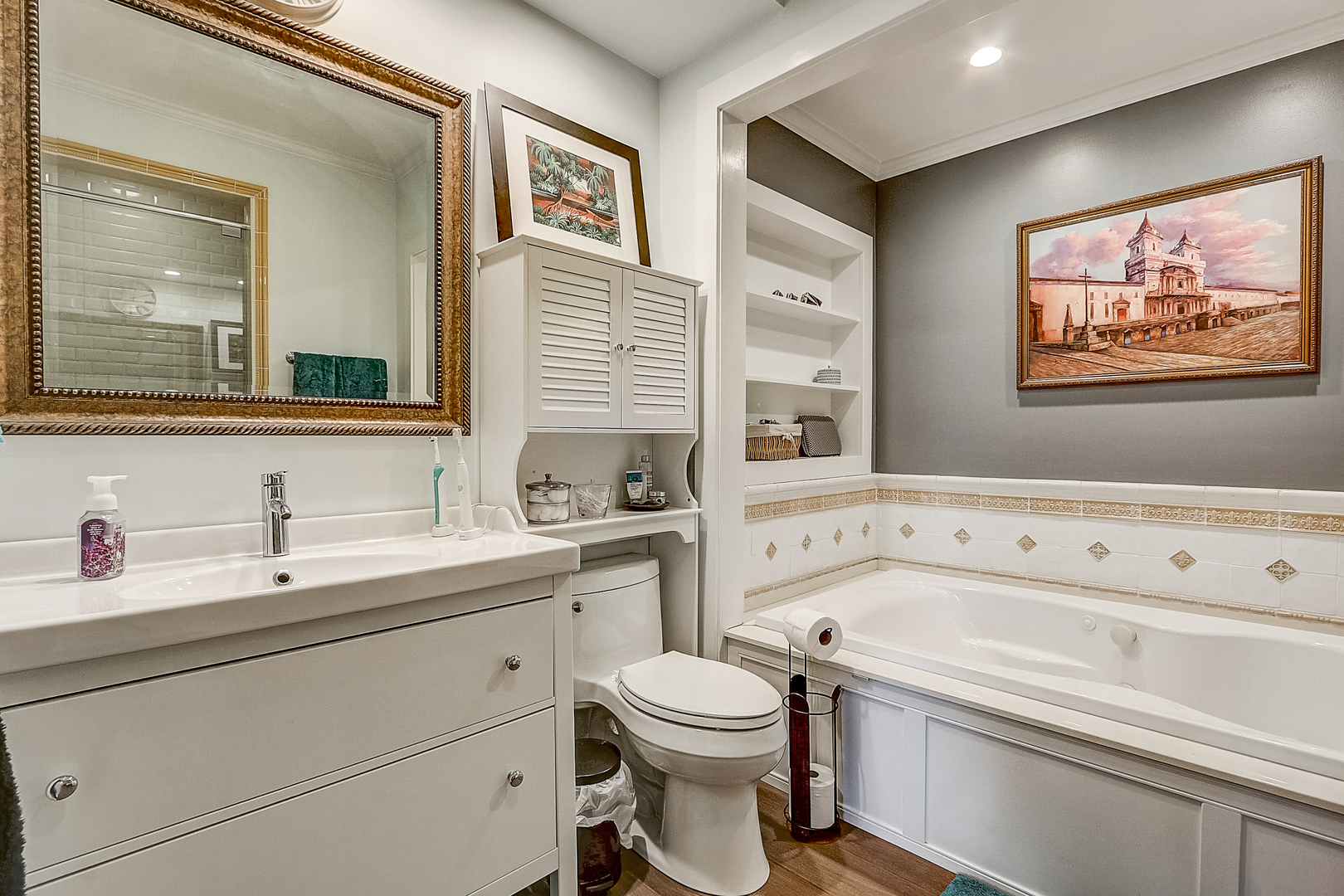 325 Gage Road Riverside, IL 60546 - Photo 22 of 44 a bathroom with a sink a toilet and a mirror