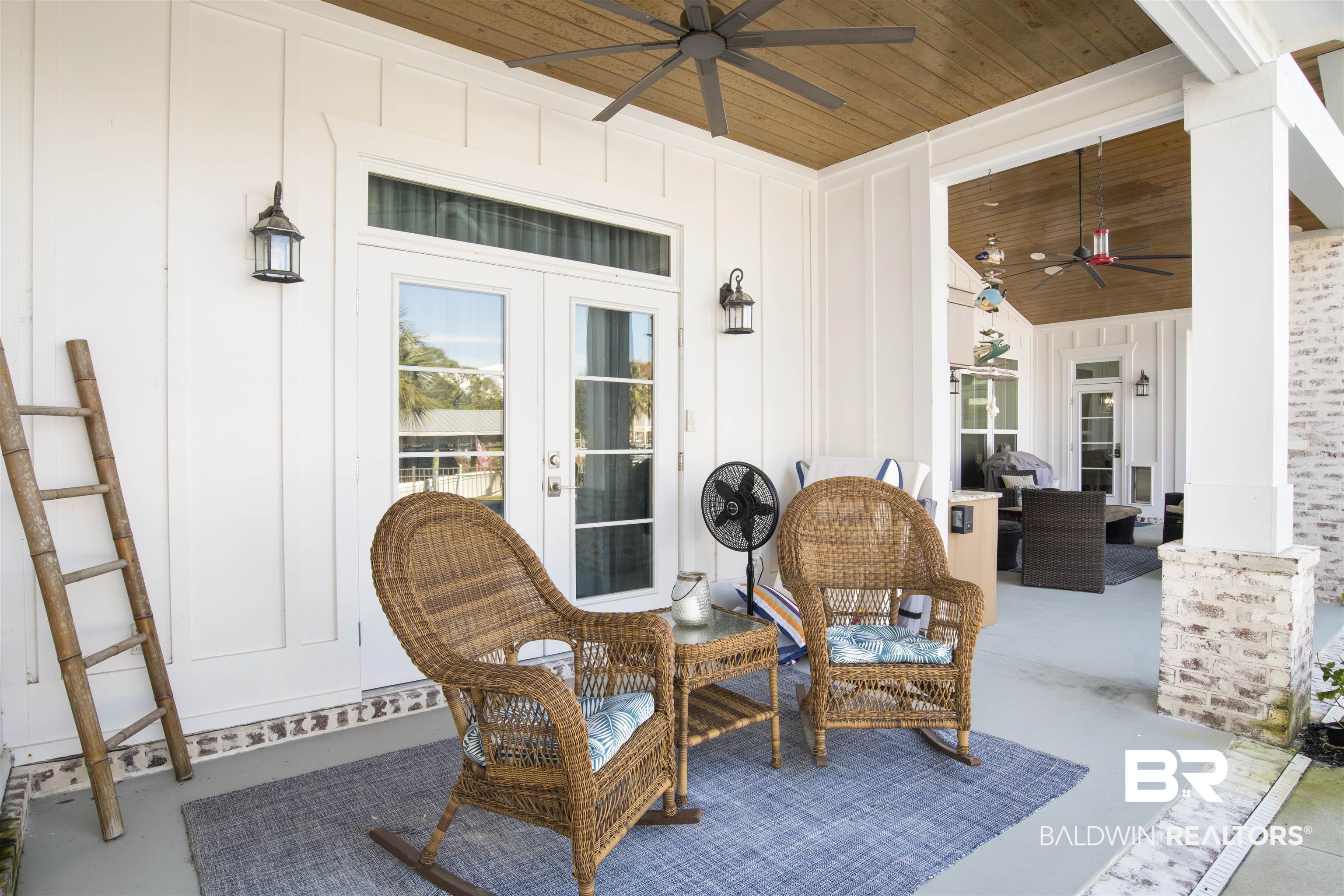 32937 River Road Orange Beach, AL 36561 - Photo 34 of 42 View of patio / terrace featuring ceiling fan, french doors, and covered porch