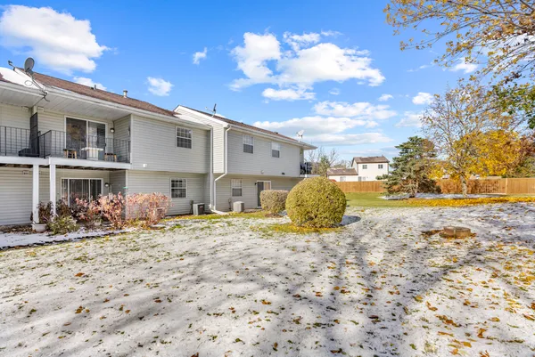 a very nice looking house with a yard