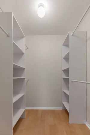 a view of an empty walk in closet