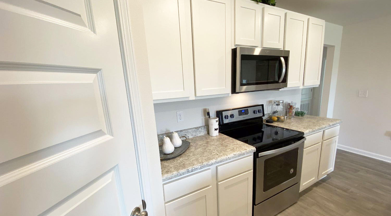 949 Indian Woman Road Santa Rosa Beach, FL 32459 - Photo 14 of 23 a kitchen with a stove and a microwave