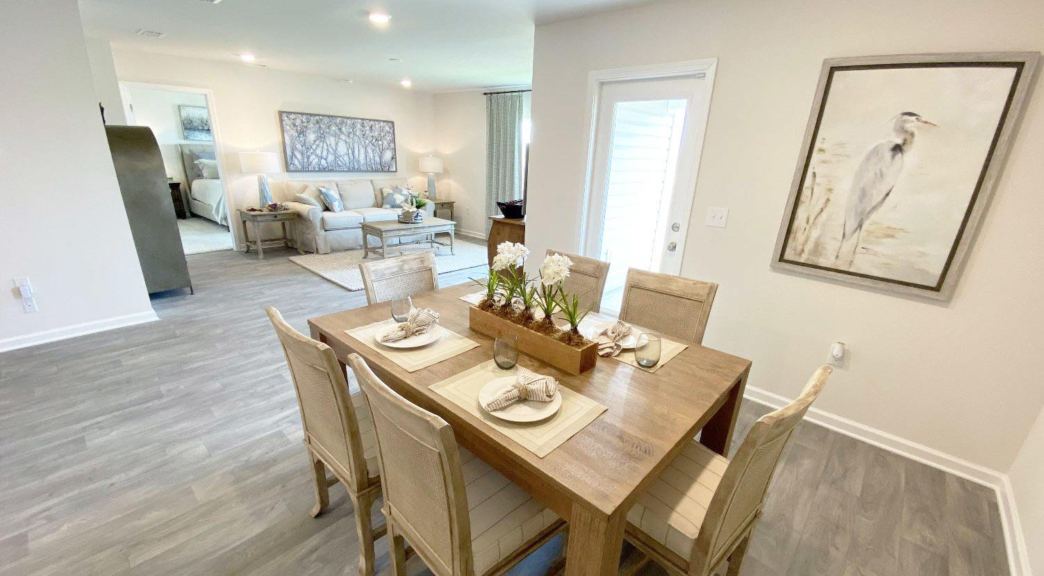949 Indian Woman Road Santa Rosa Beach, FL 32459 - Photo 8 of 23 a view of a dining room with furniture and wooden floor