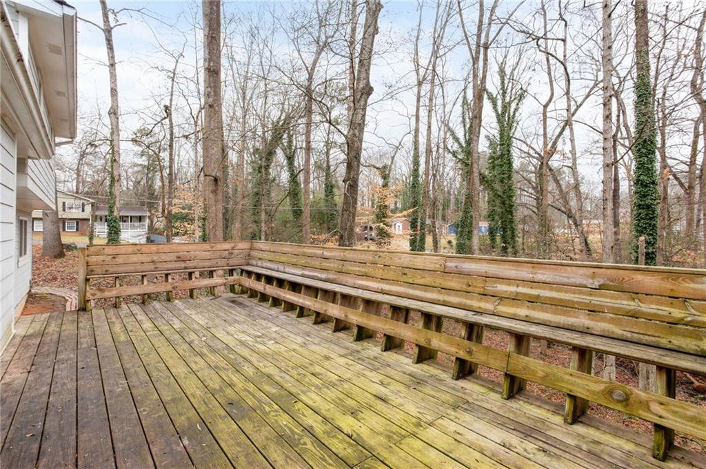 584 Fieldstream Way Northwest Lawrenceville, GA 30044 - Photo 18 of 20 a view of a roof deck with wooden floor and fence