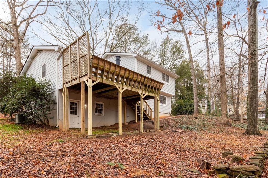 584 Fieldstream Way Northwest Lawrenceville, GA 30044 - Photo 19 of 20 a view of a house with a yard