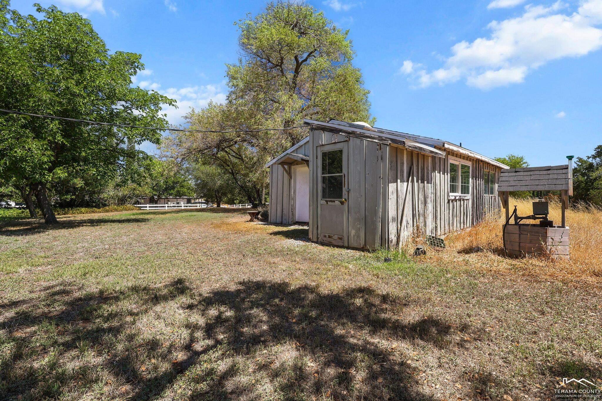 22275 Brent Road Red Bluff, CA 96080 - Photo 38 of 47 a view of a house with a yard
