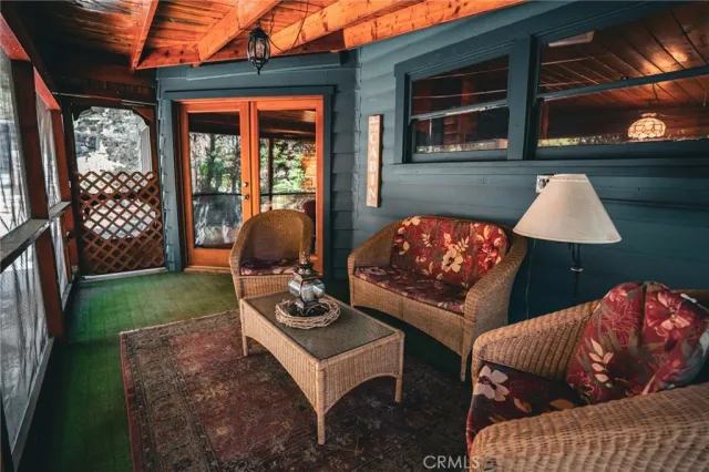 a outdoor living space with furniture and a fireplace