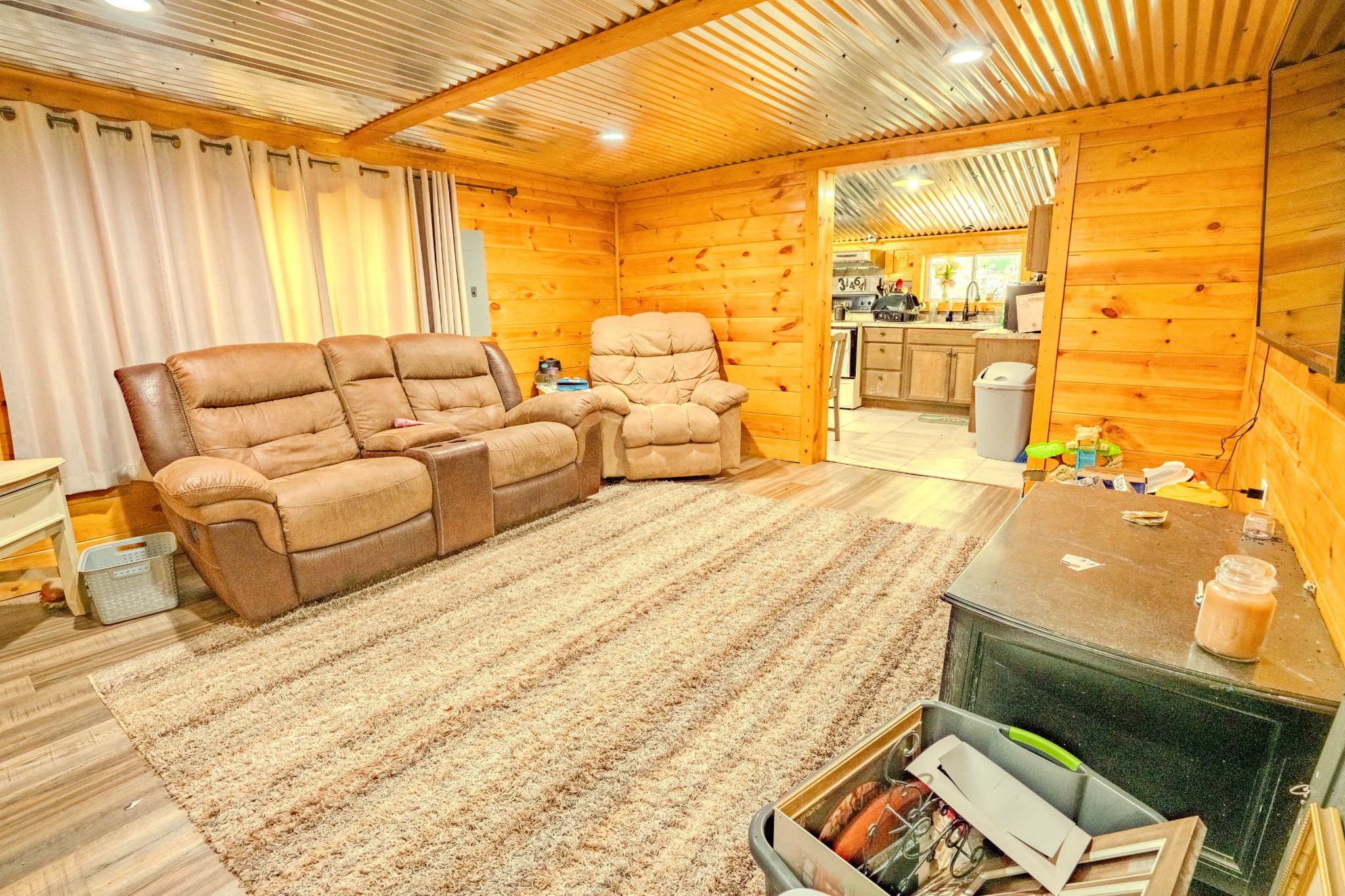 2167 Powdermill Hill Road Lawrenceburg, TN 38464 - Photo 8 of 33 a spacious bedroom with a bed and a couch