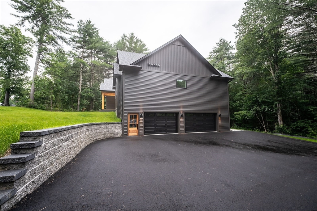 20 Merrifield Road North Bernardston, MA 01337 - Photo 41 of 41 a view of a house with a yard and a large tree
