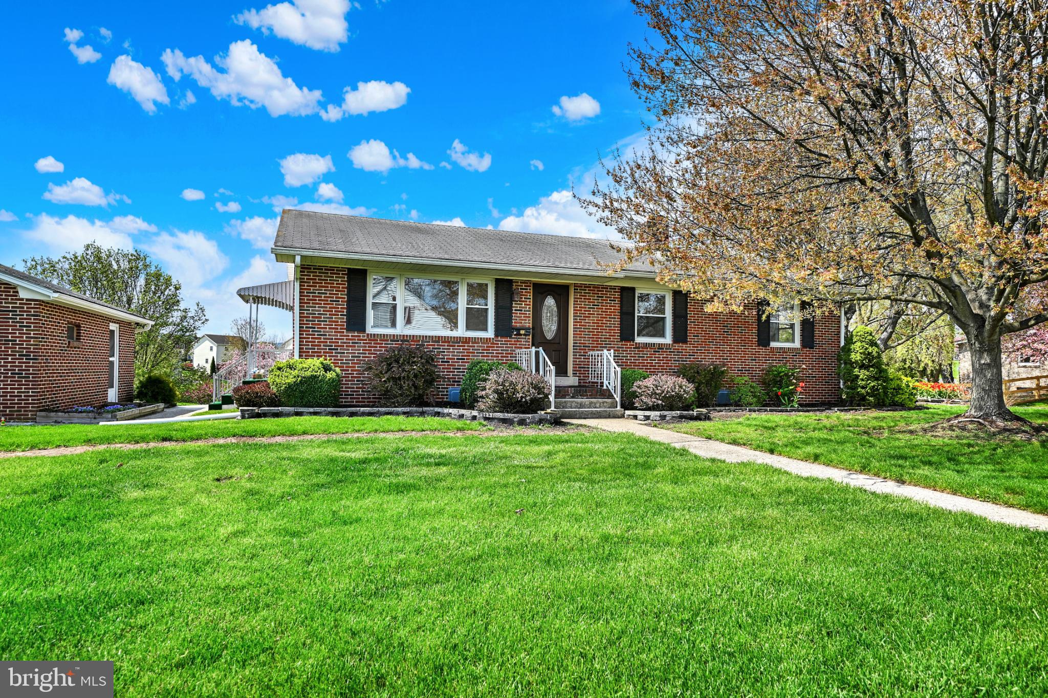33 Ridge Avenue Biglerville, PA 17307 - Photo 1 of 38 Charming brick home with lush green lawn.