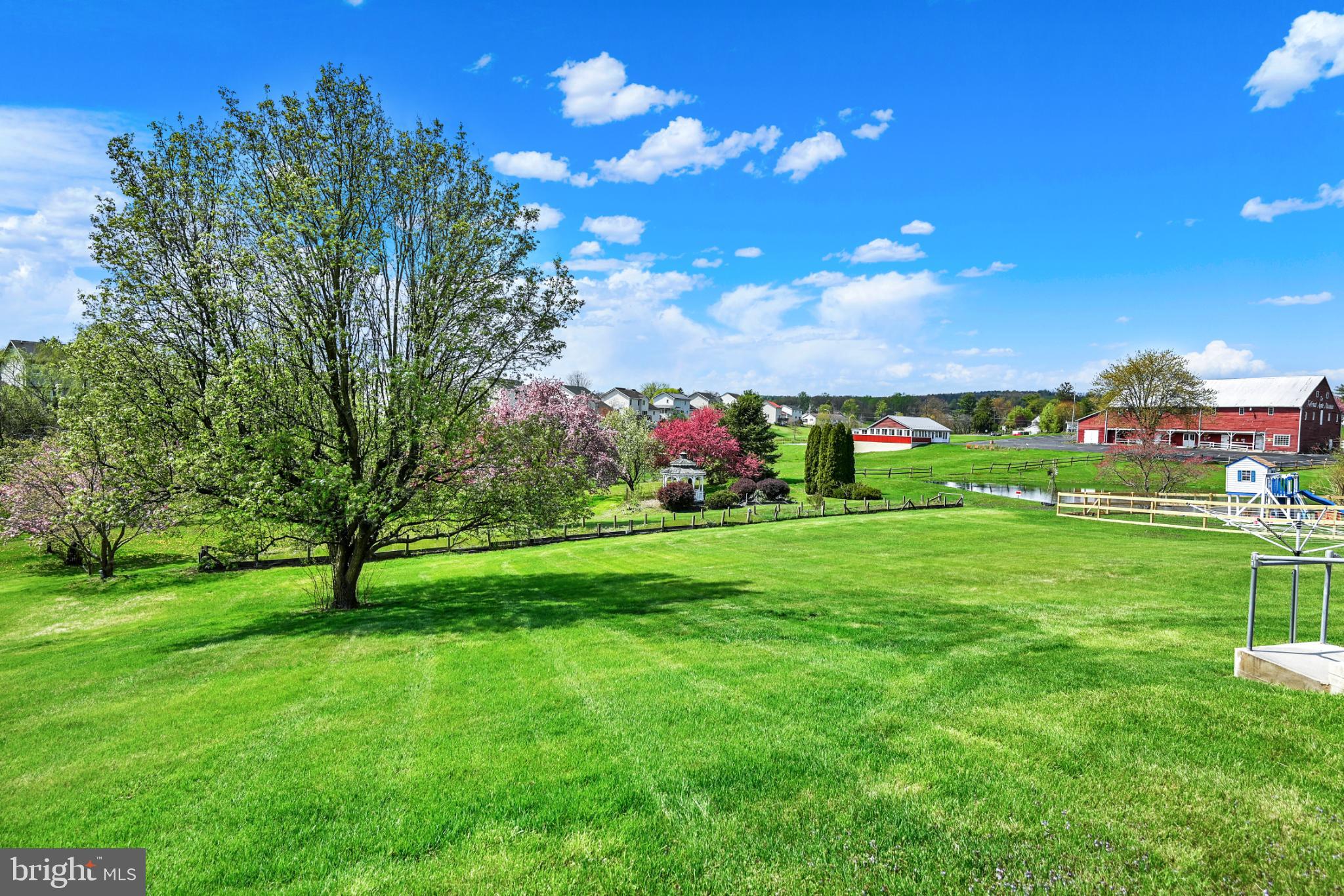 33 Ridge Avenue Biglerville, PA 17307 - Photo 12 of 38 Lush green landscape under a bright sky.