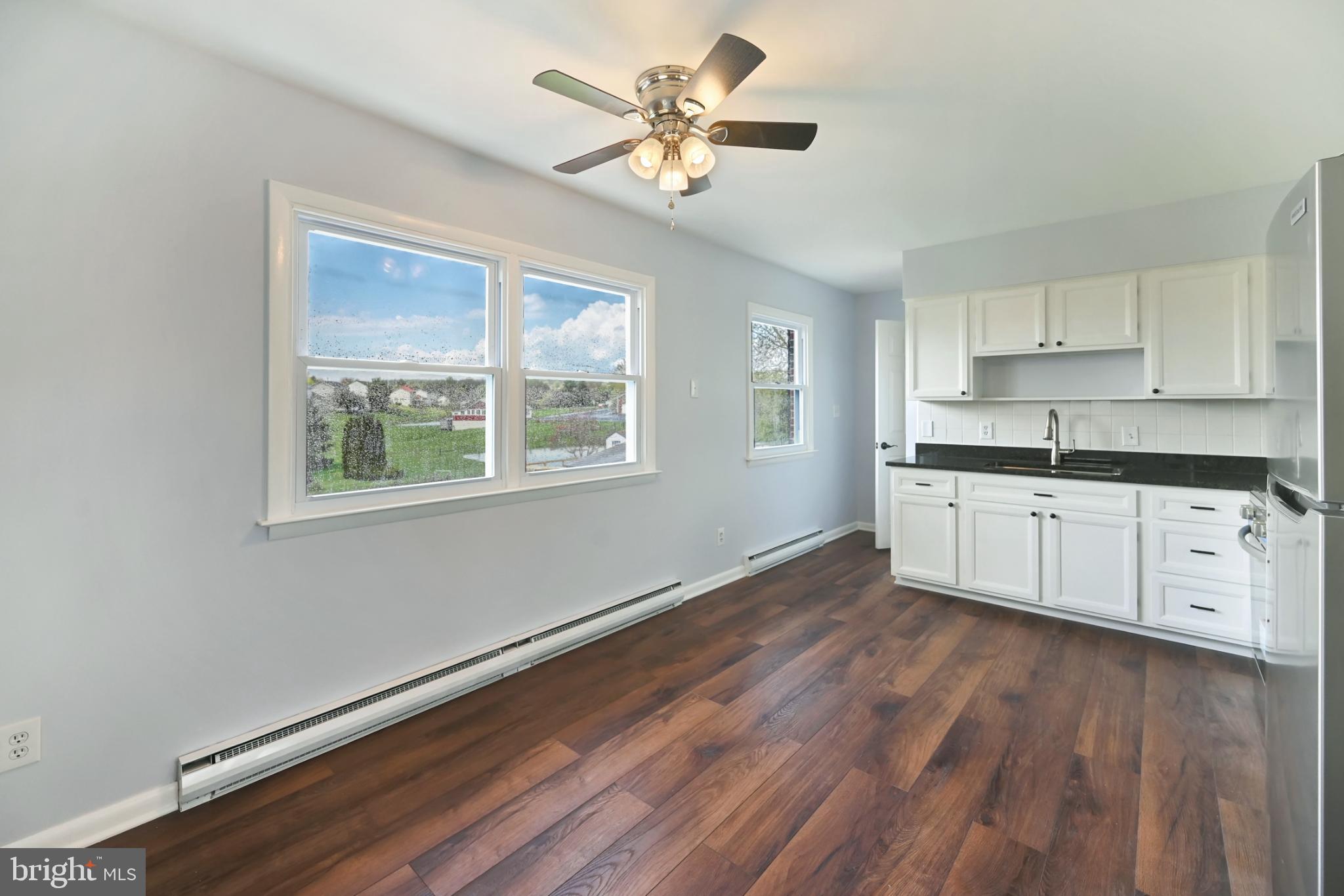 33 Ridge Avenue Biglerville, PA 17307 - Photo 19 of 38 Bright and airy kitchen with scenic views.