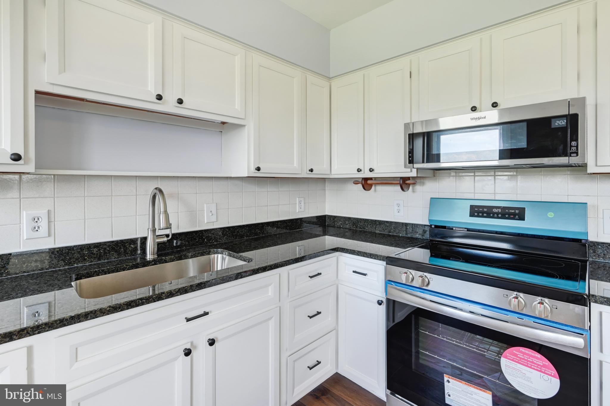 33 Ridge Avenue Biglerville, PA 17307 - Photo 20 of 38 Modern kitchen with sleek finishes.
