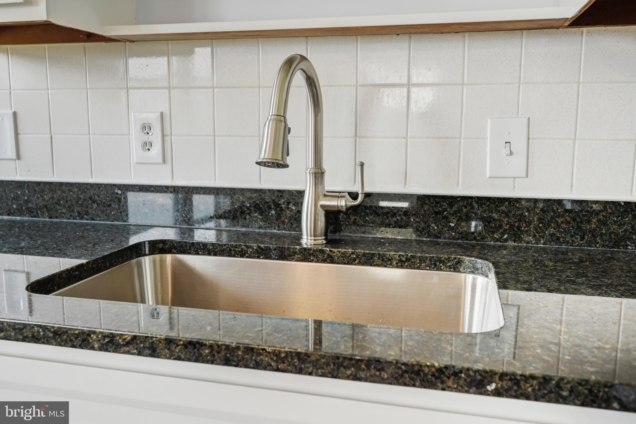 33 Ridge Avenue Biglerville, PA 17307 - Photo 21 of 38 Sleek kitchen sink with modern fixtures.