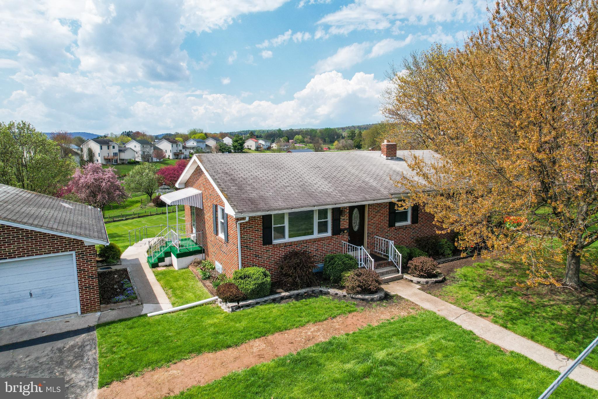33 Ridge Avenue Biglerville, PA 17307 - Photo 3 of 38 Charming brick home with lush surroundings.