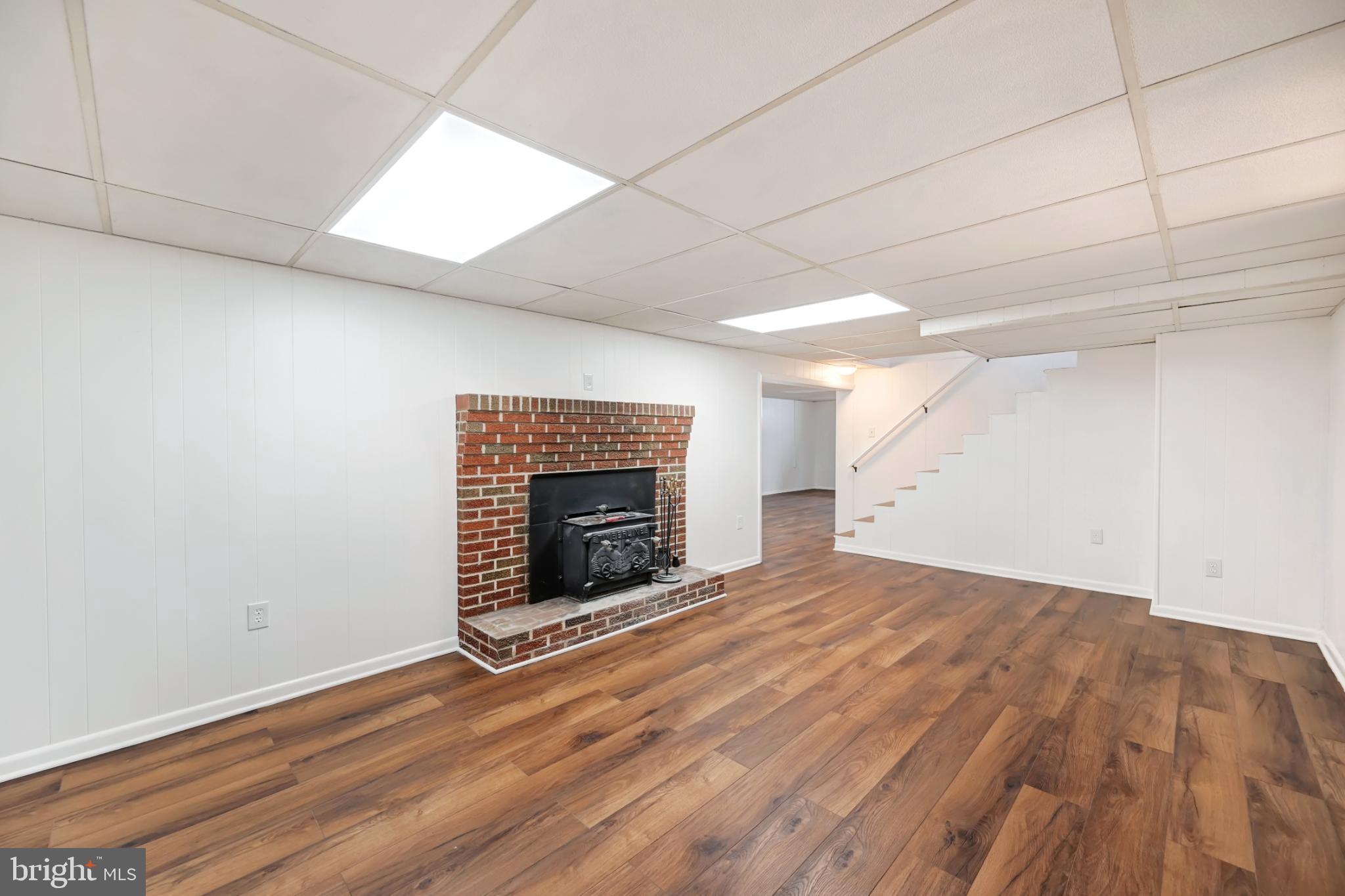 33 Ridge Avenue Biglerville, PA 17307 - Photo 33 of 38 Spacious basement with charming brick fireplace.