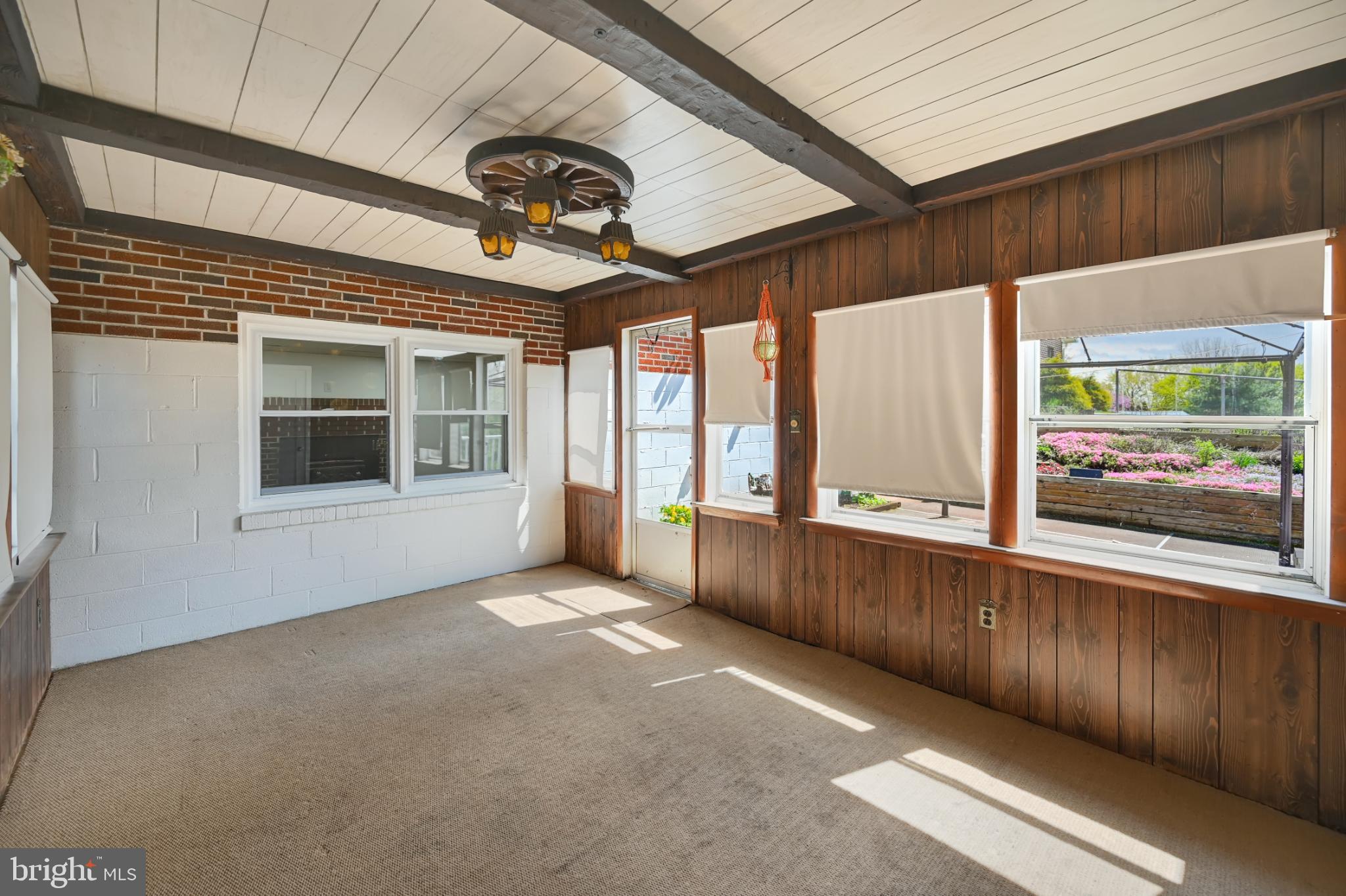 33 Ridge Avenue Biglerville, PA 17307 - Photo 37 of 38 Bright and airy sunroom with rustic charm.