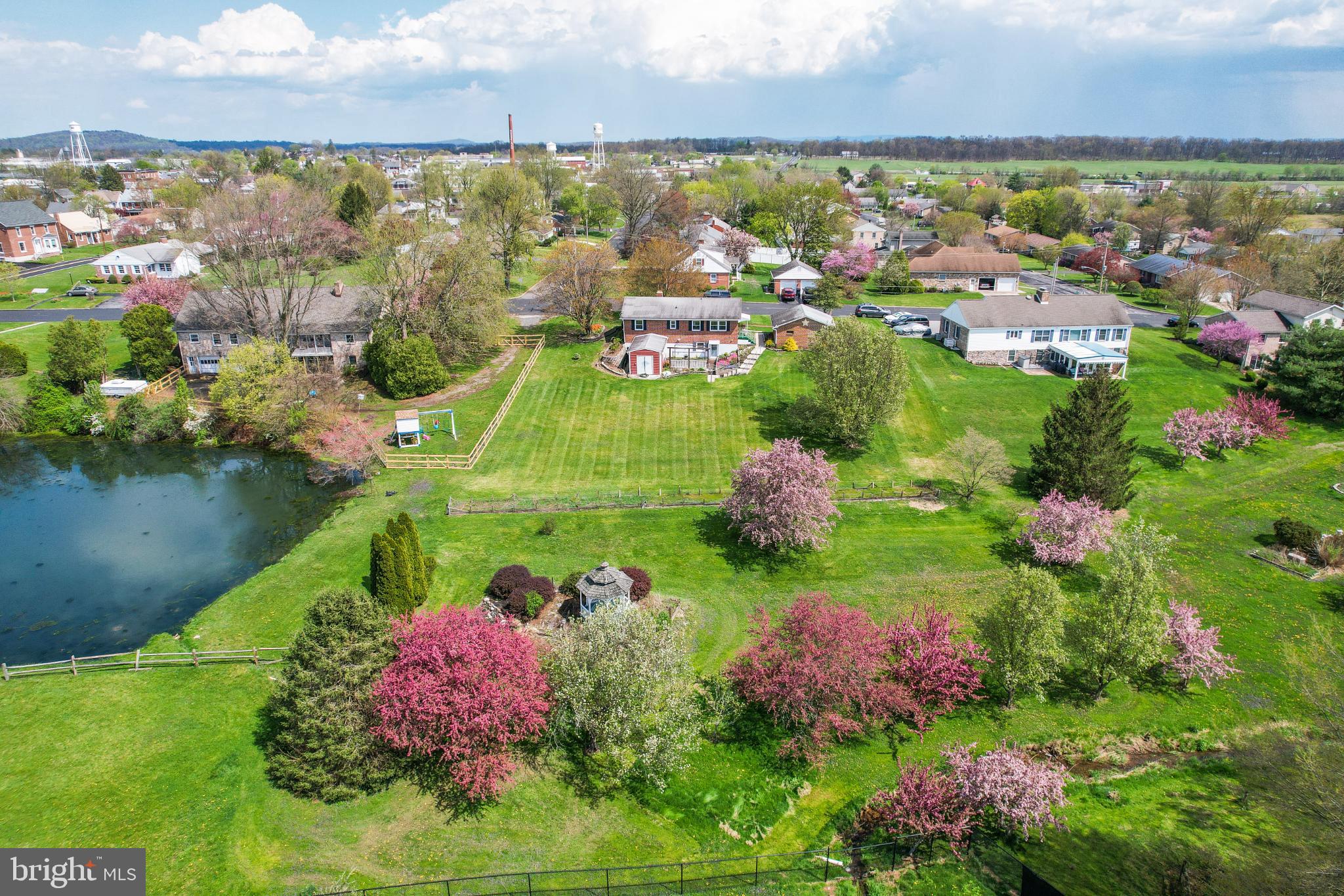 33 Ridge Avenue Biglerville, PA 17307 - Photo 6 of 38 Charming neighborhood with vibrant spring blooms.