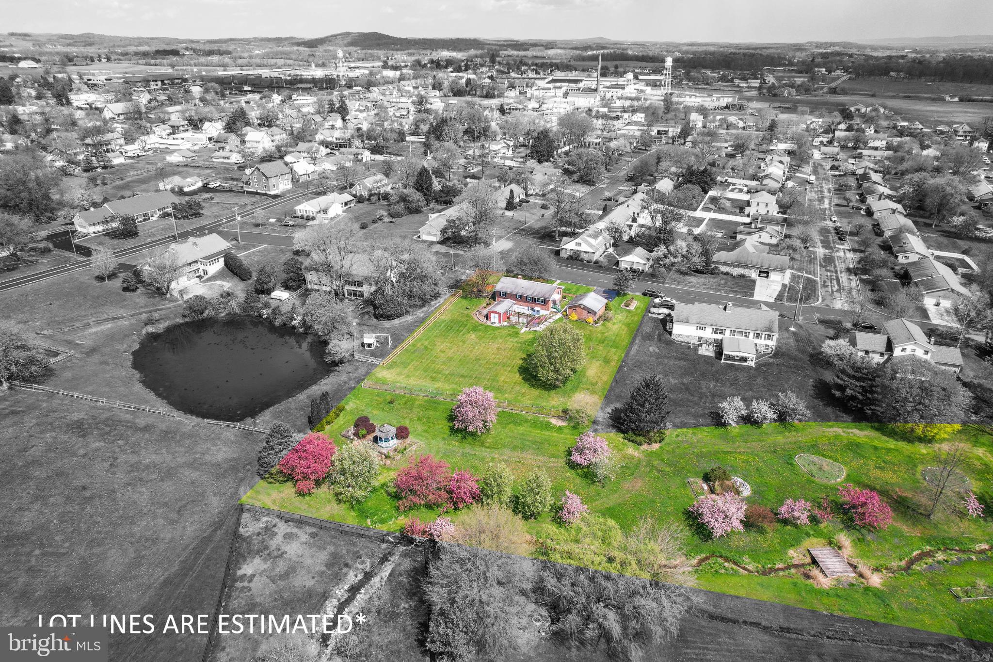 33 Ridge Avenue Biglerville, PA 17307 - Photo 8 of 38 Vibrant landscape with blooming gardens.