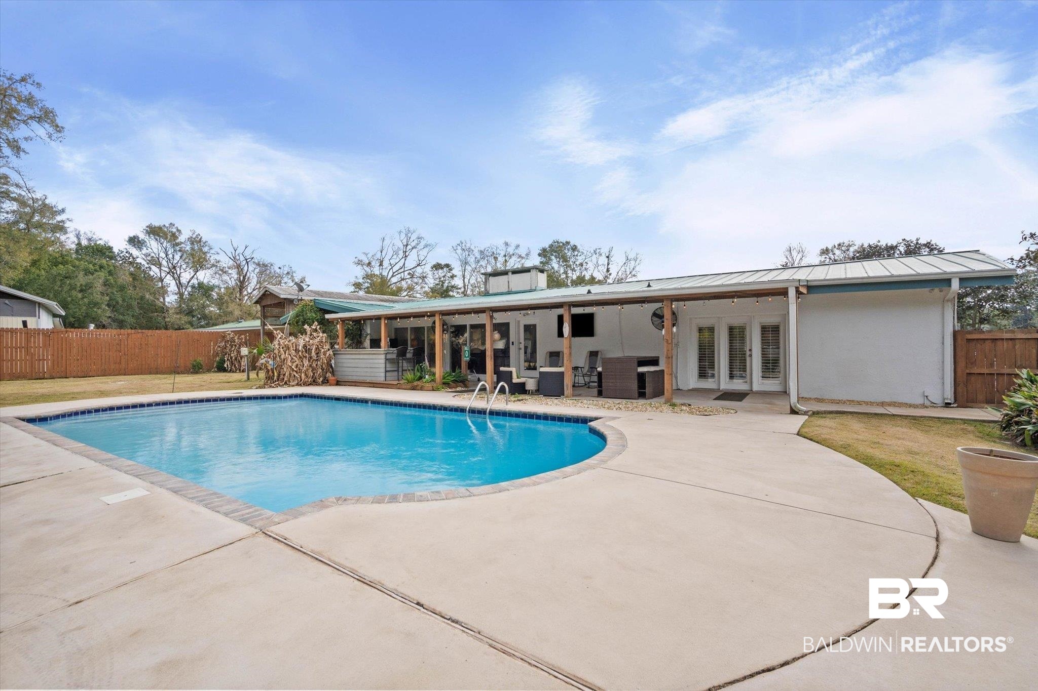 3720 Rabbit Creek Court Theodore, AL 36582 - Photo 23 of 47 View of pool featuring french doors, a fenced backyard, and a patio area