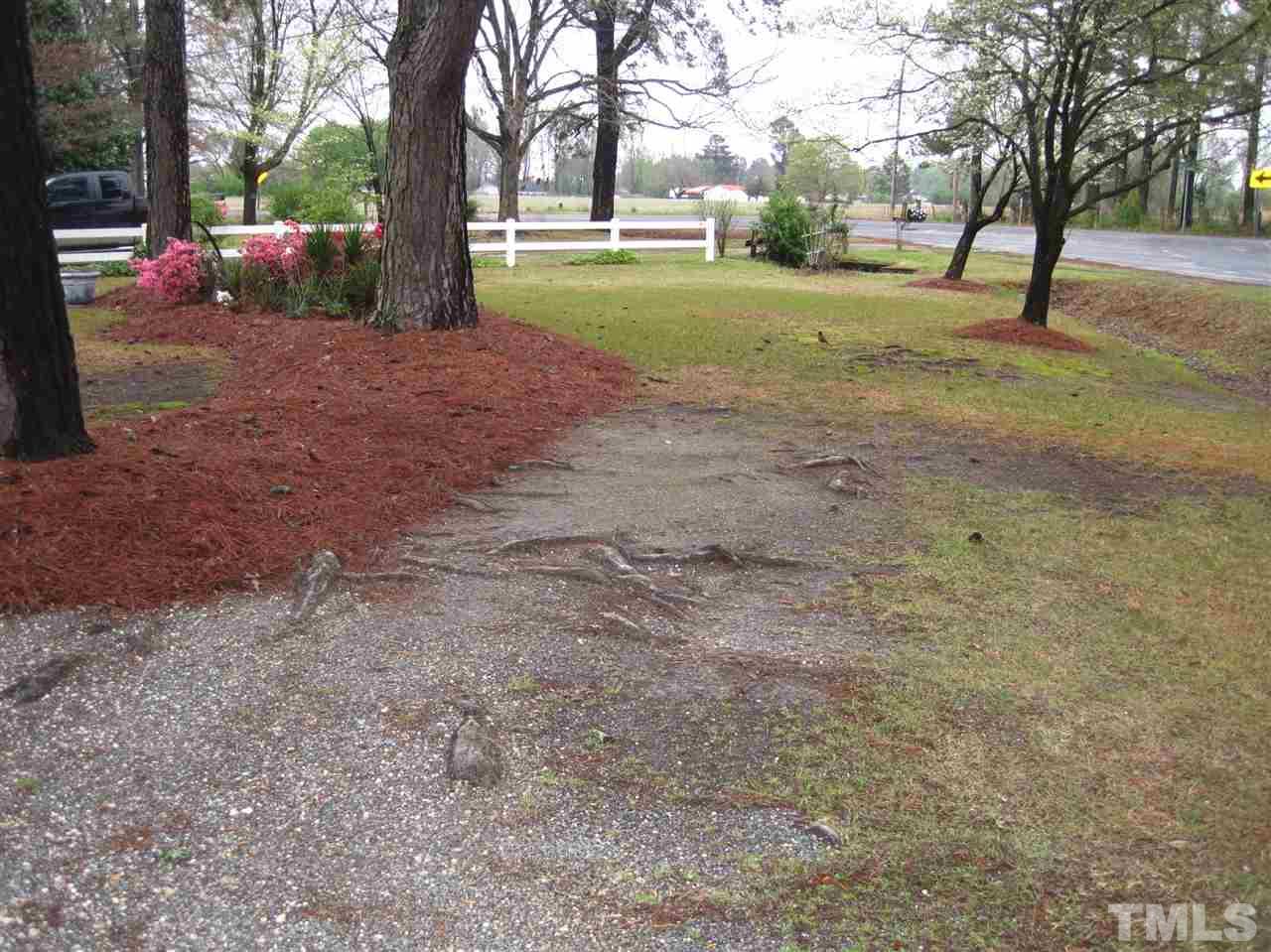 1321 West Core Road Dunn, NC 28334 - Photo 18 of 18 a view of road with yard
