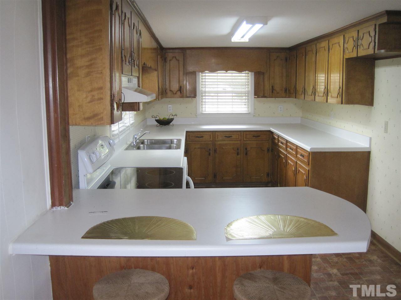 1321 West Core Road Dunn, NC 28334 - Photo 3 of 18 a view of kitchen island