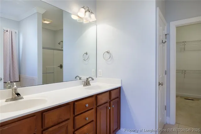 a bathroom with a tub and shower curtain