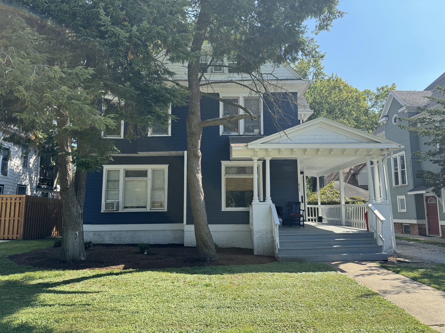 617 West Springfield Avenue Champaign, IL 61820 - Photo 1 of 10 front view of a house with a yard