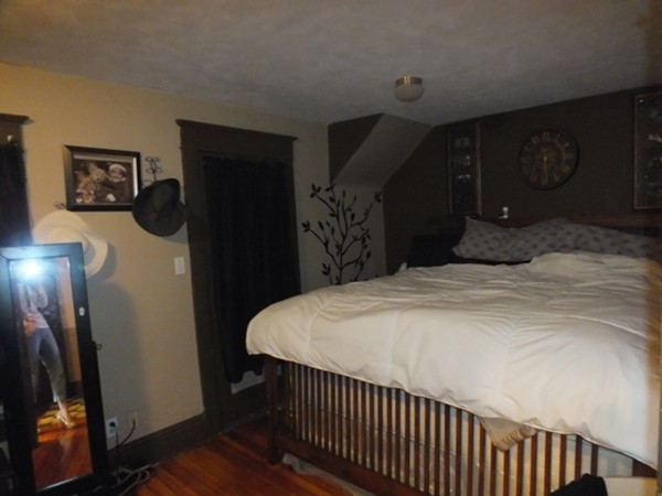 106 Stockman Street Springfield, MA 01104 - Photo 17 of 20 a bedroom with a bed and a closet