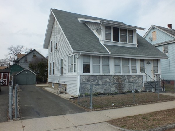 106 Stockman Street Springfield, MA 01104 - Photo 2 of 20 a front view of a house with garage