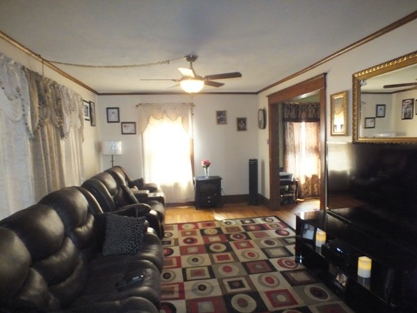106 Stockman Street Springfield, MA 01104 - Photo 7 of 20 a living room with furniture and a rug
