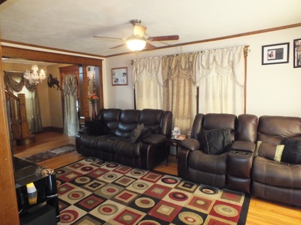 106 Stockman Street Springfield, MA 01104 - Photo 8 of 20 a living room with a couch and a rug