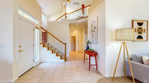 a kitchen with stainless steel appliances granite countertop a refrigerator stove and microwave