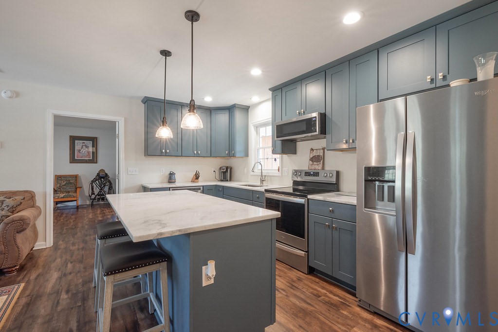 4336 Hells Bend Road Palmyra, VA 22963 - Photo 8 of 35 Contemporary kitchen featuring blue cabinetry, sta