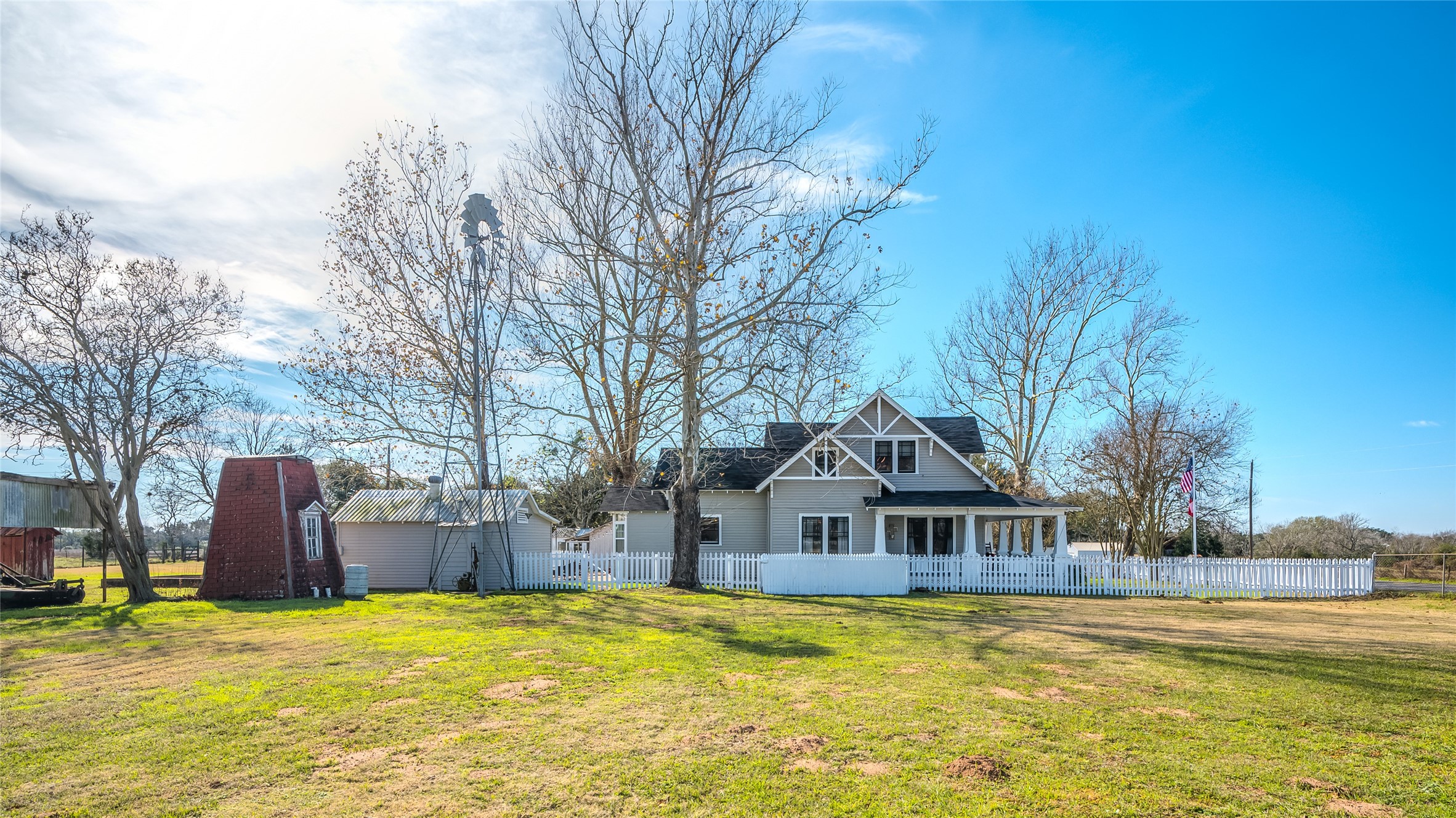 10152 Farm To Market Road 949 Cat Spring, TX 78933 - Photo 15 of 50 a front view of house with yard and trees