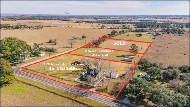 a view of a city with an ocean