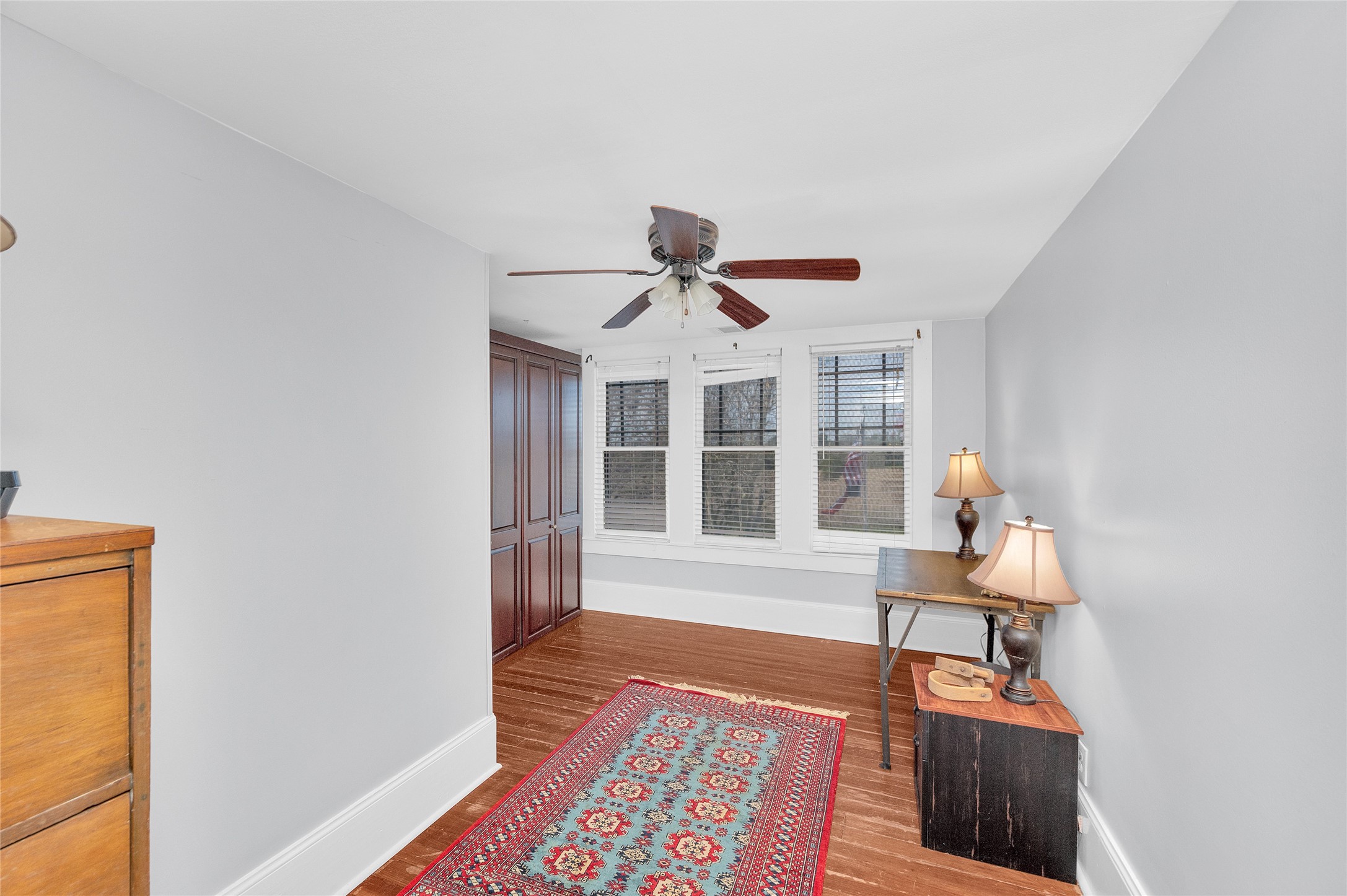 10152 Farm To Market Road 949 Cat Spring, TX 78933 - Photo 32 of 50 a front view of a house with wooden floor and a rug