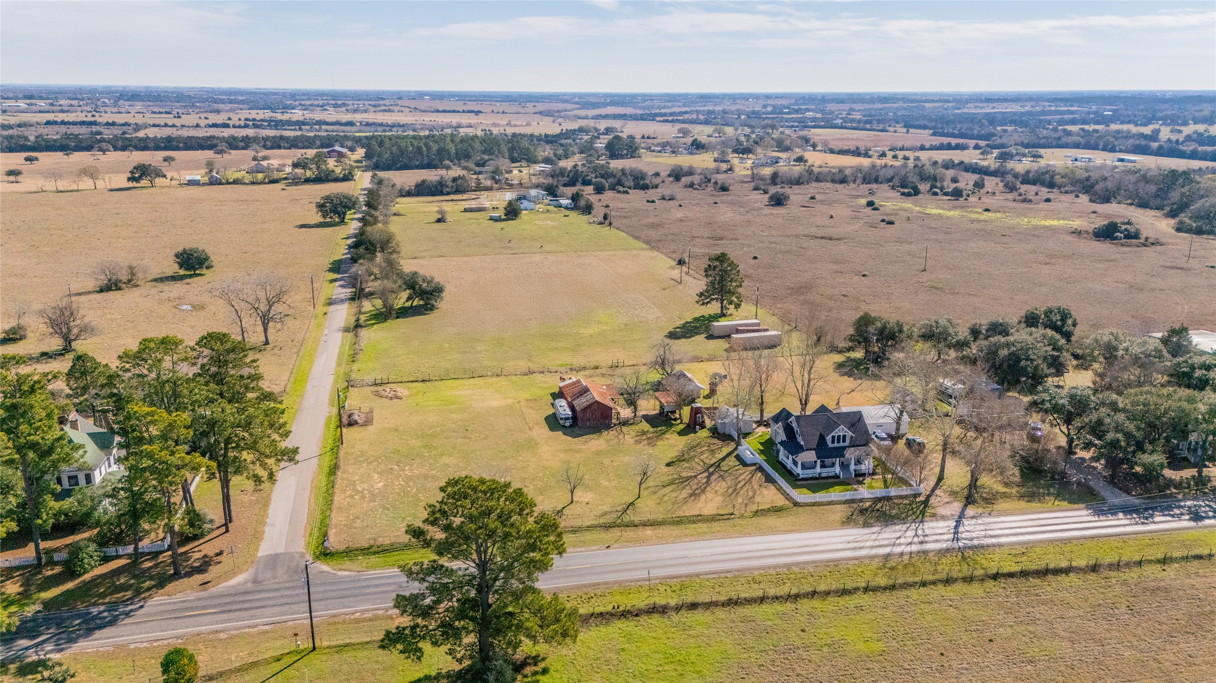10152 Farm To Market Road 949 Cat Spring, TX 78933 - Photo 44 of 50 an aerial view of a house with a lake view