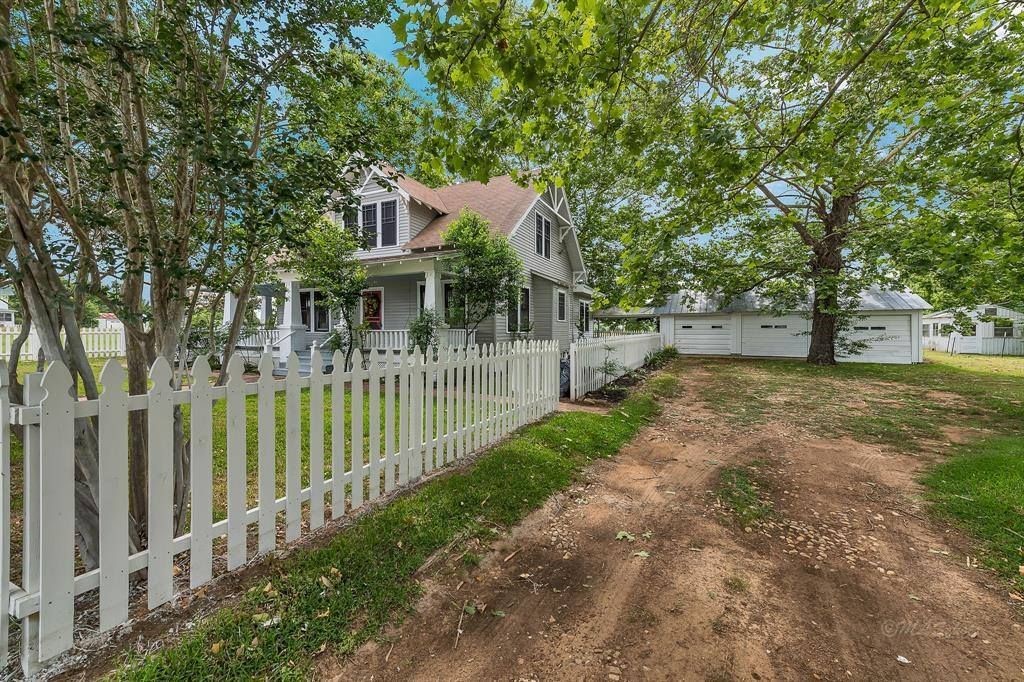 10152 Farm To Market Road 949 Cat Spring, TX 78933 - Photo 49 of 50 a view of a house with a small yard and plants