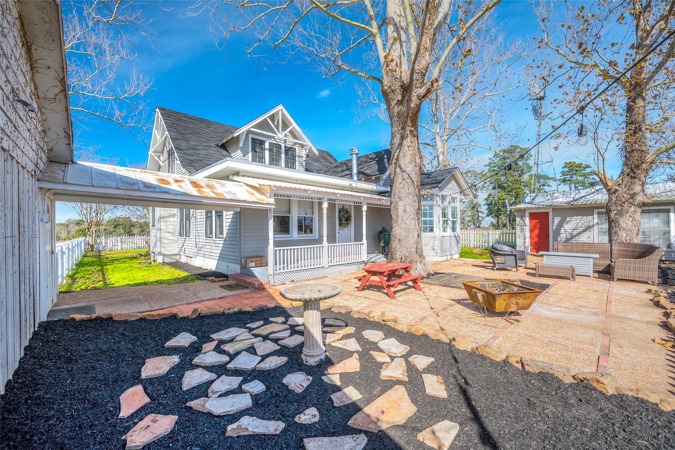 10152 Farm To Market Road 949 Cat Spring, TX 78933 - Photo 9 of 50 a view of a house with swimming pool and sitting area