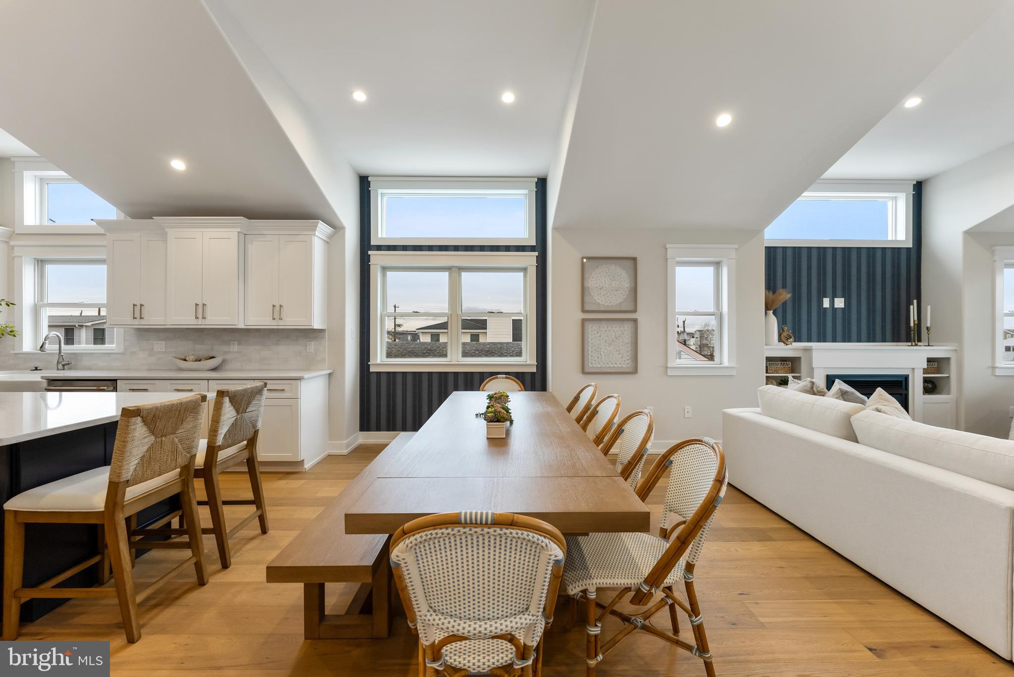 16 67th Street Sea Isle City, NJ 08243 - Photo 23 of 40 a living room with stainless steel appliances kitchen island granite countertop furniture and a kitchen view