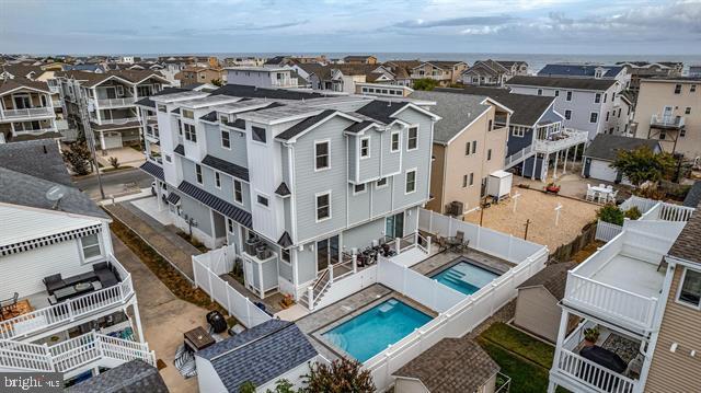 16 67th Street Sea Isle City, NJ 08243 - Photo 3 of 40 an aerial view of a building