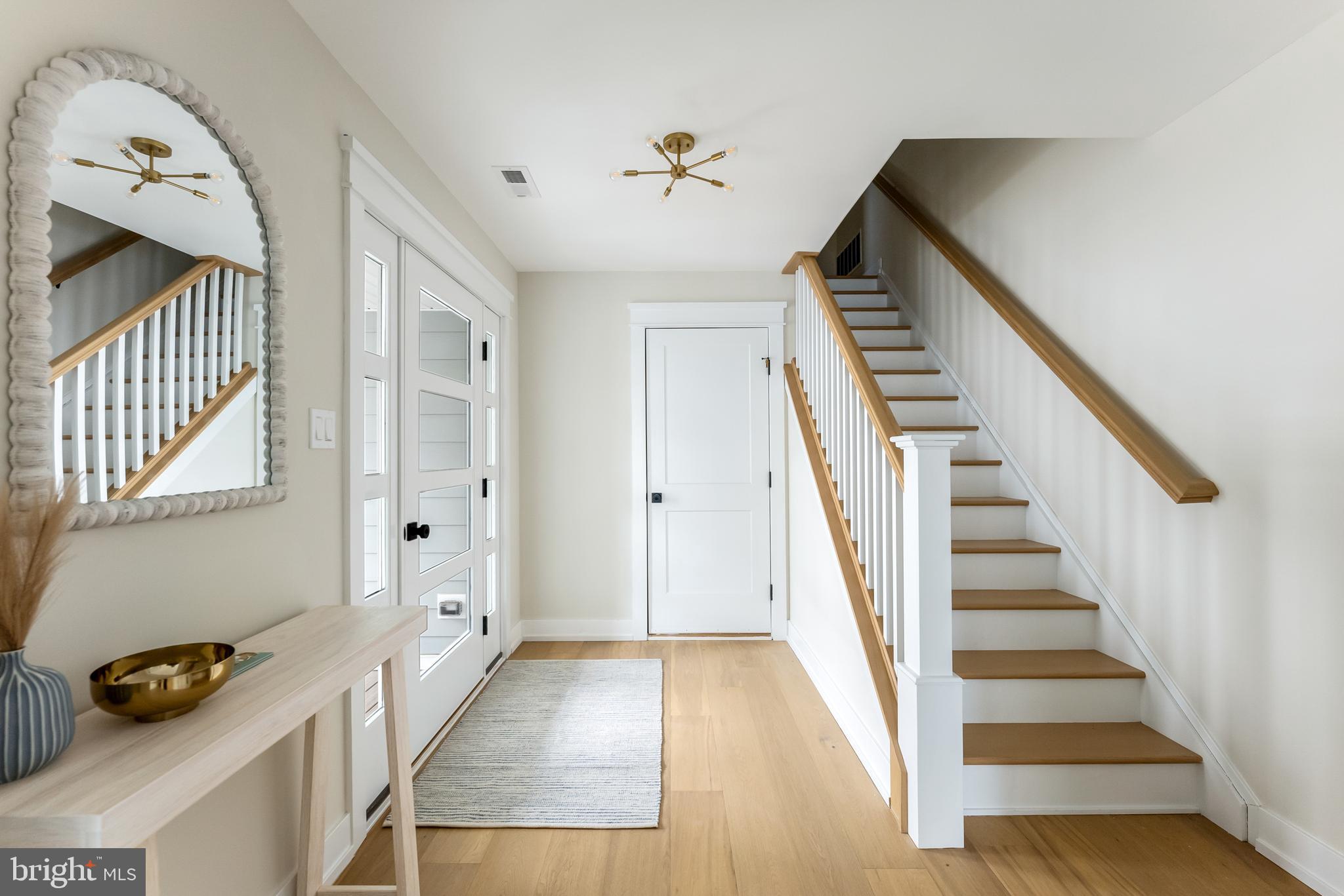 16 67th Street Sea Isle City, NJ 08243 - Photo 8 of 40 a view of entryway and hall with wooden floor