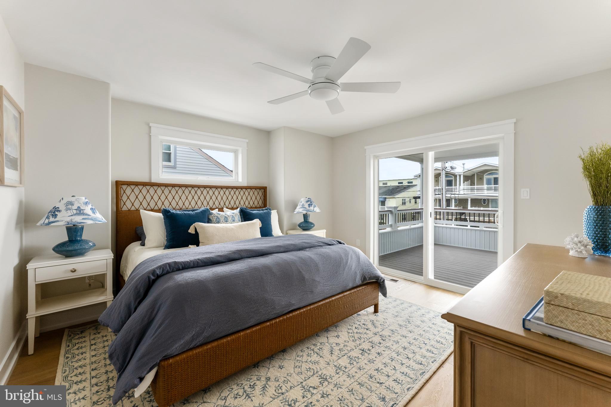 16 67th Street Sea Isle City, NJ 08243 - Photo 9 of 40 a bedroom with a large bed and a couch