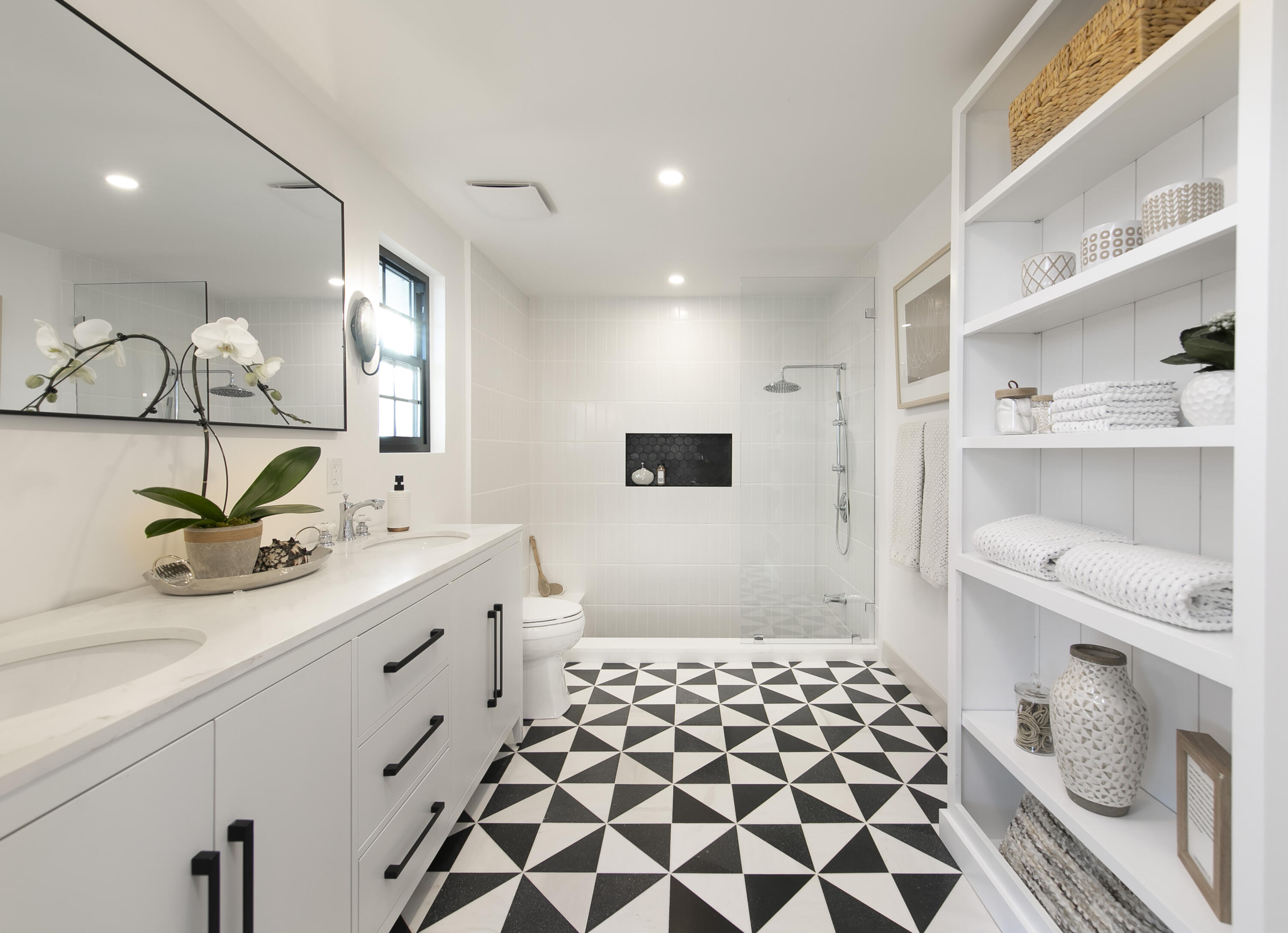 1514 Crestline Drive Santa Barbara, CA 93105 - Photo 12 of 25 a spacious bathroom with a double vanity sink toilet and a mirror