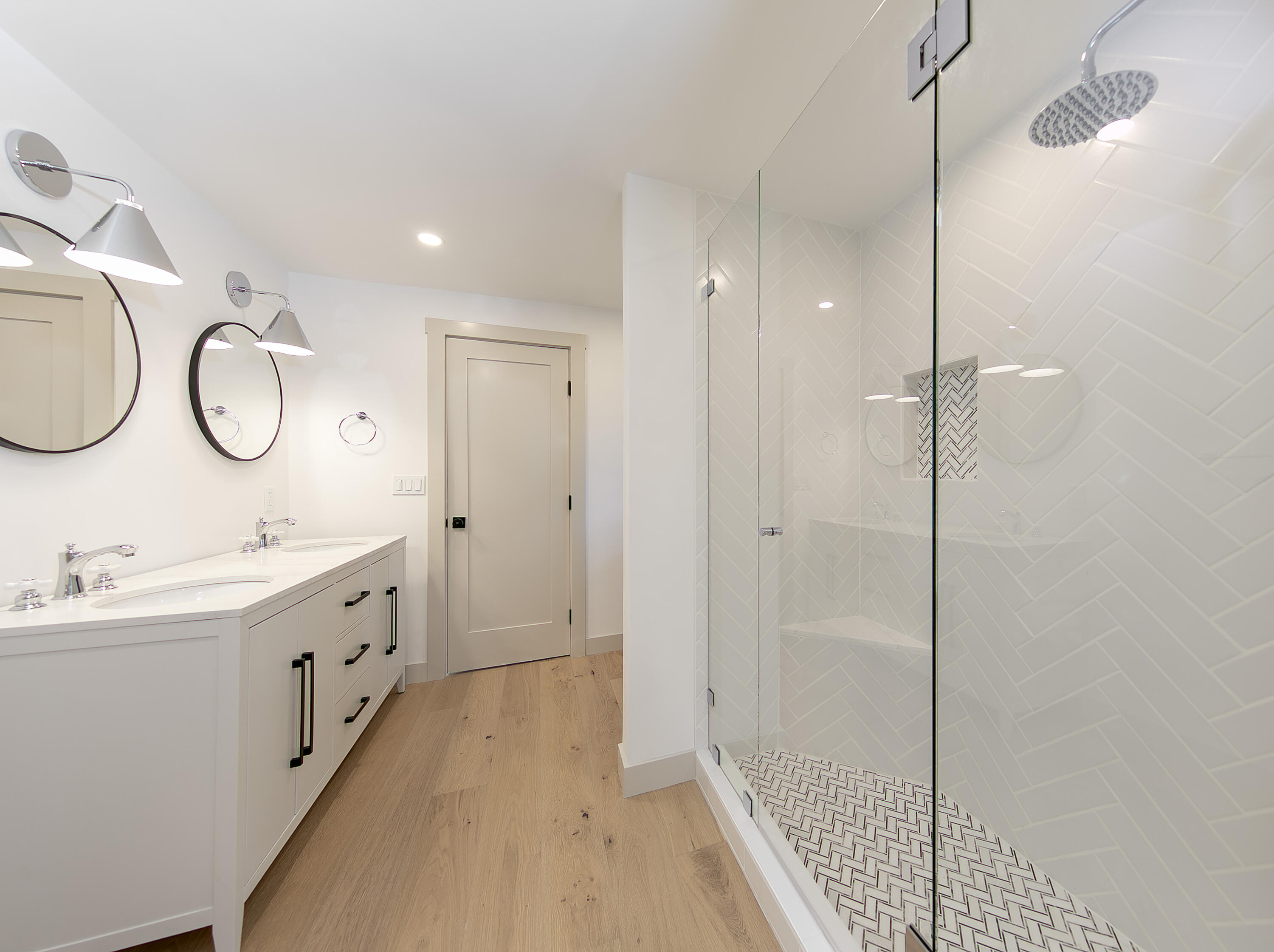1514 Crestline Drive Santa Barbara, CA 93105 - Photo 15 of 25 a bathroom with a double vanity sink a mirror and a shower