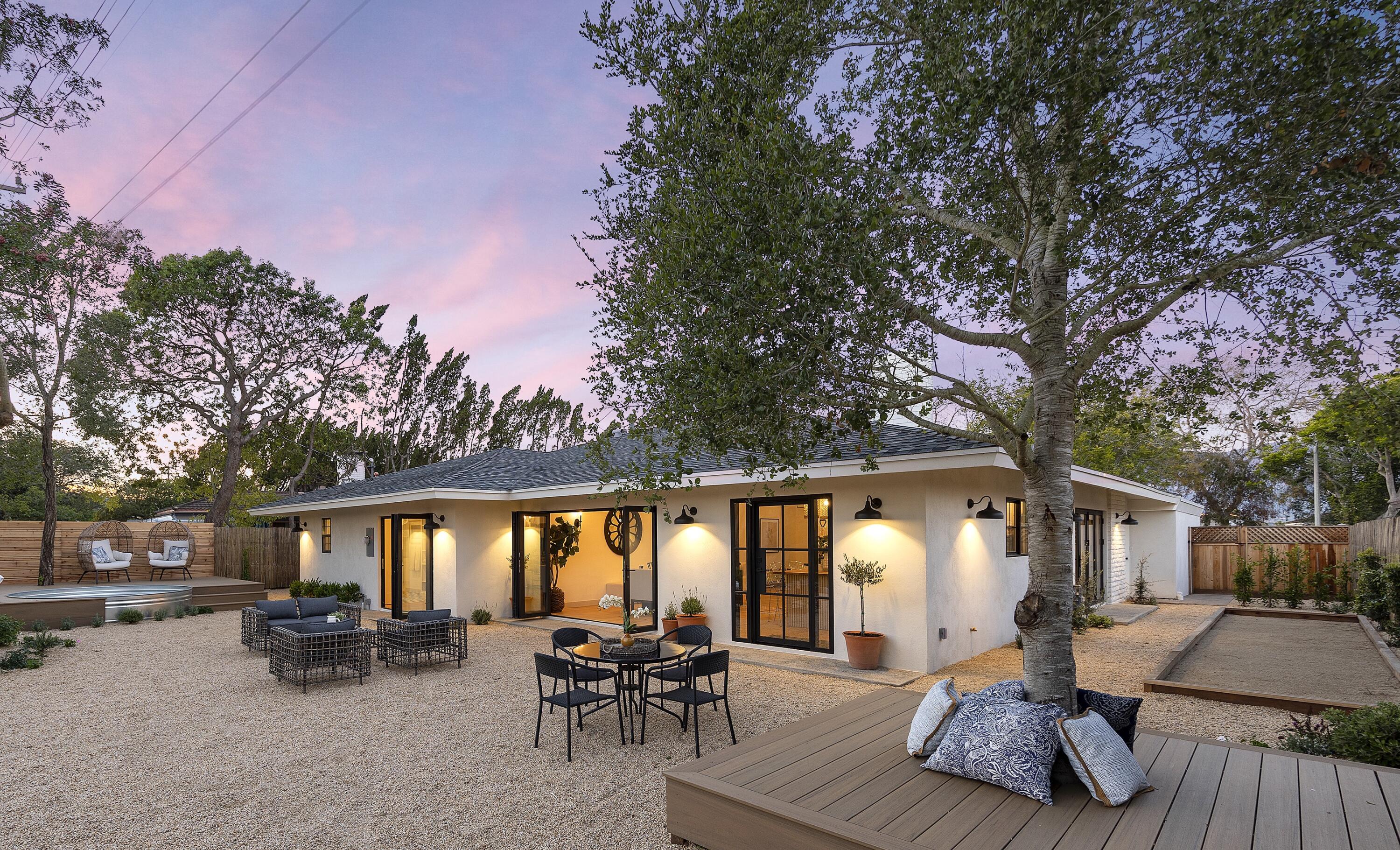 1514 Crestline Drive Santa Barbara, CA 93105 - Photo 23 of 25 a view of a patio with couches table and chairs and wooden floor