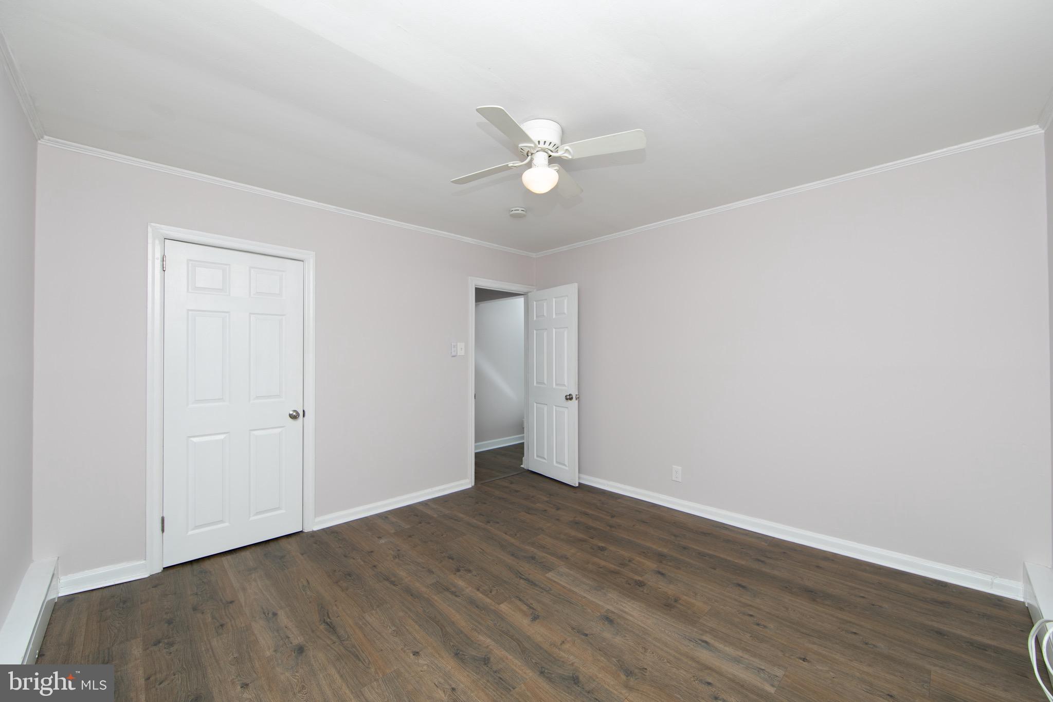 553 Maple Avenue Audubon, NJ 08106 - Photo 15 of 49 a view of an empty room with wooden floor