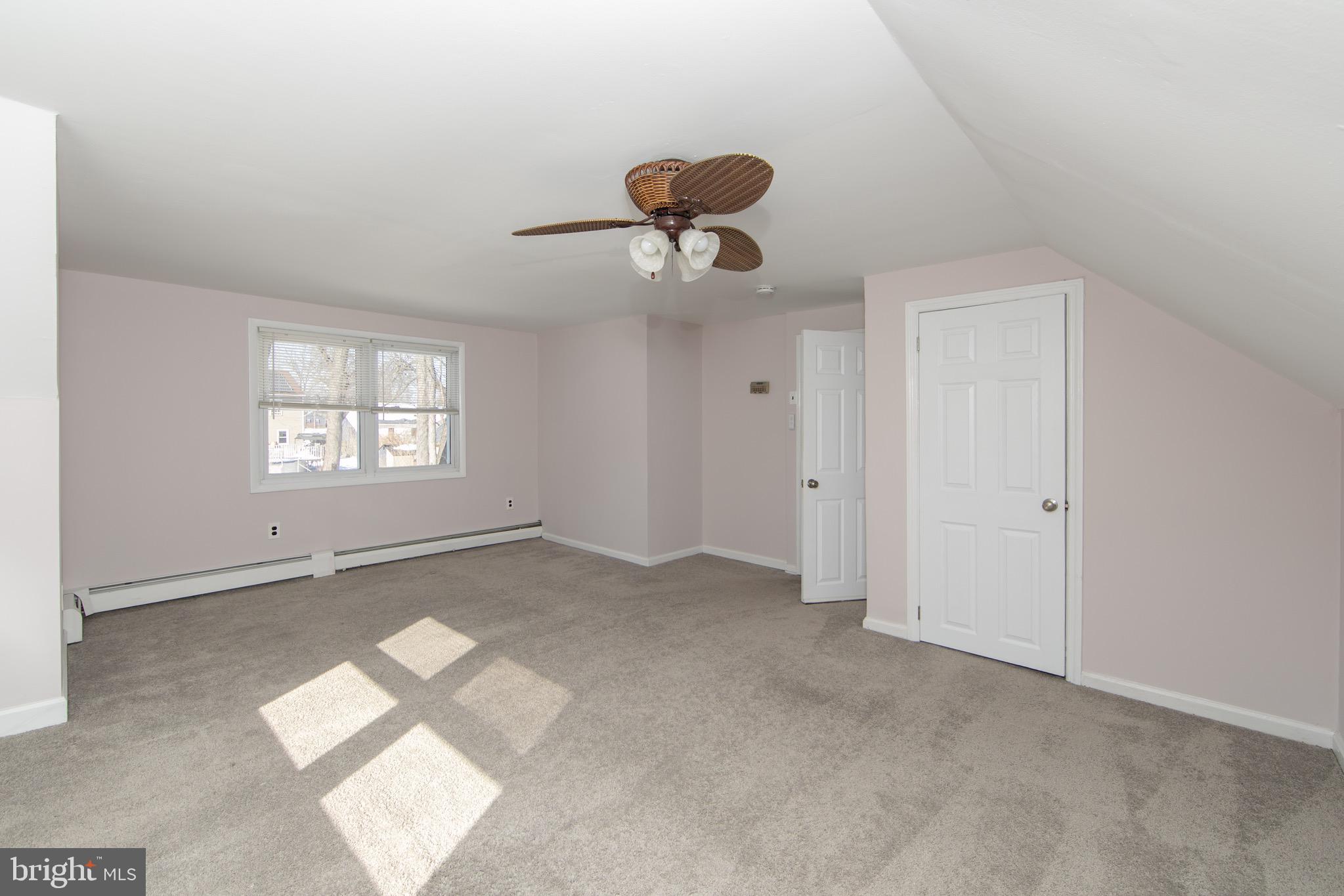 553 Maple Avenue Audubon, NJ 08106 - Photo 21 of 49 a view of an empty room with a window